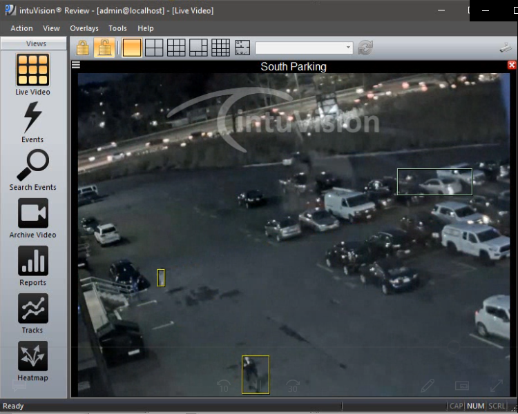 Person detection and classification in poorly lit parking lot at night.